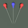Three Red and Blue Droppers with Clear Tubes on Green Background