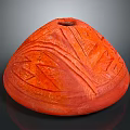 Red Ceramic Pot With Intricate Carved Sculpture Patterns And Textures