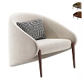 Beige Upholstered Single Sofa With Black And White Houndstooth Pillow And Dark Wooden Legs