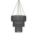 Elegant Multi Tiered Crystal Chandelier With Shiny Crystal Strands And Gold Accents Hanging In Room