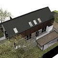 Modern Guesthouse Building With Large Windows Outdoor Terrace Surrounding Greenery And Parking Area