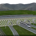 High Speed Train Emerging From Arched Tunnel On Railway Tracks With Green Vegetation And Mountains