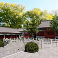 Ancient Chinese Architecture Courtyard With Stone Railings Red Walls Gray Roofs And Lush Trees