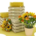 Floral Display with Sunflowers and Green Leaves in Stacked Wooden Crates and Flower Pots