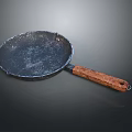 Household Iron Cooking Pan With Wooden Handle And Vintage Black Surface