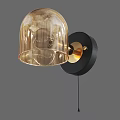 Modern Wall Lamp Featuring Amber Glass Shade Gold Metal And Black Base Design