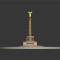 Monument Structure With Golden Statue On Circular Base And Green Lawn Cross Pathways