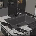 Modern Kitchen Sink With Black Faucet On Black And White Marble Countertop