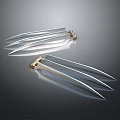 Sharp Metal Claw Weapons With Silver Blades Golden Handles And Reflective Surface