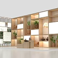 Wooden Display Shelves with Potted Plants and Decorative Items Under Warm Lighting in Modern Showcase