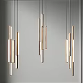 Modern Linear Pendant Lights With Metallic Design Hanging In Contemporary Interior Space