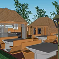 Outdoor Dining Area With Wooden Tables Benches Lamp Post Brick Buildings And Green Trees