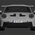 White Sports Car Featuring Red Wheels Rear Spoiler And Aerodynamic Design
