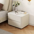 Modern White Bedside Table with Transparent Vase White Flowers Books and Eyeglasses