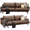 Modern Brown Leather Two Seater Sofa With Decorative Pillows Throw Blanket And Metal Legs