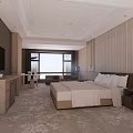Modern Hotel Guest Room With King Bed Flat Screen TV And Sofa Seating