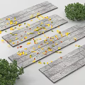 Rockery Stones With Gray Stone Path Fallen Leaves And Green Shrubs
