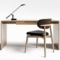 Modern Minimalist Wooden Desk With Dark Seat Chair And Black Arm Table Lamp