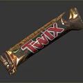 Twix Chocolate Bar With Golden Wrapper And Red Brand Logo