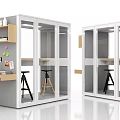 Modern Office Cubicles With Glass Partitions Desks Stools Green Plants And Wall Decor