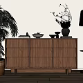 Wooden Decorative Cabinet with Potted Plant Floor Lamp and Decorative Items on Top in Interior