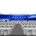 Spacious Conference Venue With Arranged Seats Stage Lights And Large Screen