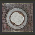 Brick Paved Square Structure With Circular White Center And Two Holes
