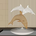 Decorative Golden And White Mesh Dolphin Sculpture With Circular Wave Pattern Base On Striped Wall
