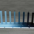 DP Device With Multiple Different Colored Columns Arranged On Flat Plate And Gray Textured Background