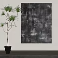 Black and White Abstract Painting Hanging on White Wall with Green Plant