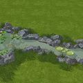 Beautiful Waterside Landscape With Green Grass Rocks Pond Water Lilies And Fish