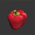 Fresh Ripe Red Bell Pepper with Green Stem on Dark Surface