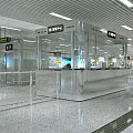 Modern Metro Station Interior Design With Service Counter Signage Bright Lighting And Polished Floor