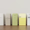 Vintage Retro Refrigerators In Multiple Colors Display On Wooden Floor With Light Wall
