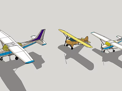 Three Colorful Toy Airplanes Featuring White Yellow Blue White Design With Gray Background Shadows 3d model