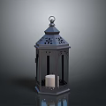 Black Metal Lantern With Intricate Cutout Design And White Candle Inside