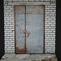 Old Rusty Metal Double Door Furniture With White Brick Wall And Cement Floor