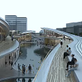 Modern Office Building Complex With Curved Walkways Water Pond And Gathering People