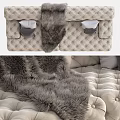 Comfortable Beige Tufted Sectional Sofa With Decorative Pillows Throw Blanket And Fur Rug