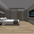 Modern Hotel Guest Room With King Bed Flat Screen TV And Wooden Flooring