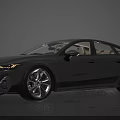 Sleek Gray Sports Sedan With Aerodynamic Design Large Alloy Wheels And Modern Front Grille