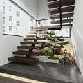 Modern Indoor Wooden Staircase with Glass Railing and Small Pine Tree with Stones and Moss