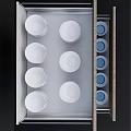 Organized Dinnerware Set Storage In Wooden Drawers With Neatly Arranged White Plates And Bowls