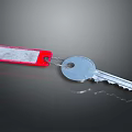 Silver Key Hardware Tool With Red Tag And White Label Area On Dark Background 3d model