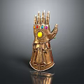 Sculpted Golden Infinity Gauntlet With Intricate Design And Colored Gemstones