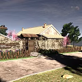Rural Self Built House With Stone Walls Pink Flowering Trees Yard And White Car