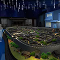 Cultural Center Showcasing Ancient City Model With Night Scene Lighting And Silhouettes