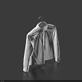 Simple White Shirt Hanging On Hanger Against Dark Blue Background