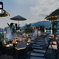 Outdoor Restaurant Dining Area With Thatched Roof String Lights Fountain And Stone Path