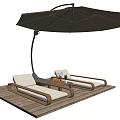 Outdoor Lounge Chairs With White Cushions Under Brown Parasol On Wooden Deck